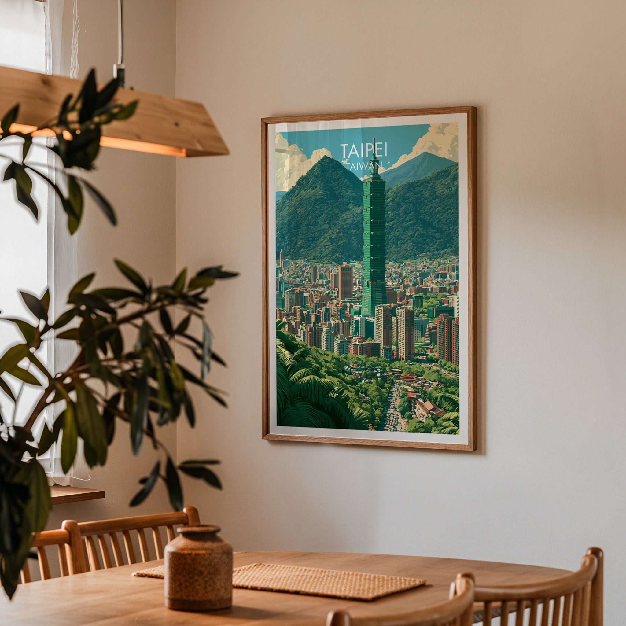Framed Taipei Taiwan print on a dining room wall above an oak table in warm afternoon light