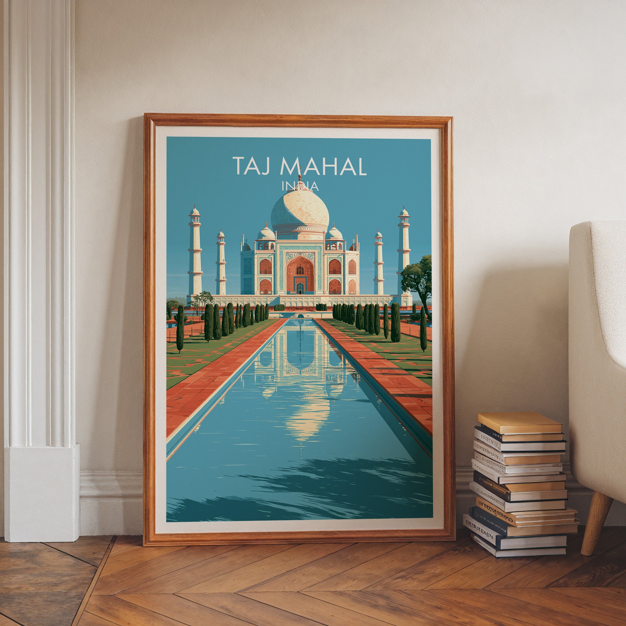 Taj Mahal Agra India art print in a walnut frame leaning in a hallway beside stacked books