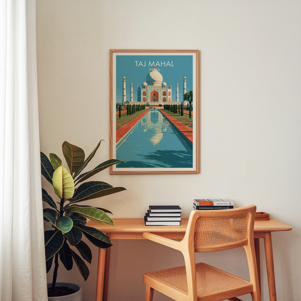 Taj Mahal Agra India wall art above a wooden home office desk with a rattan chair and books