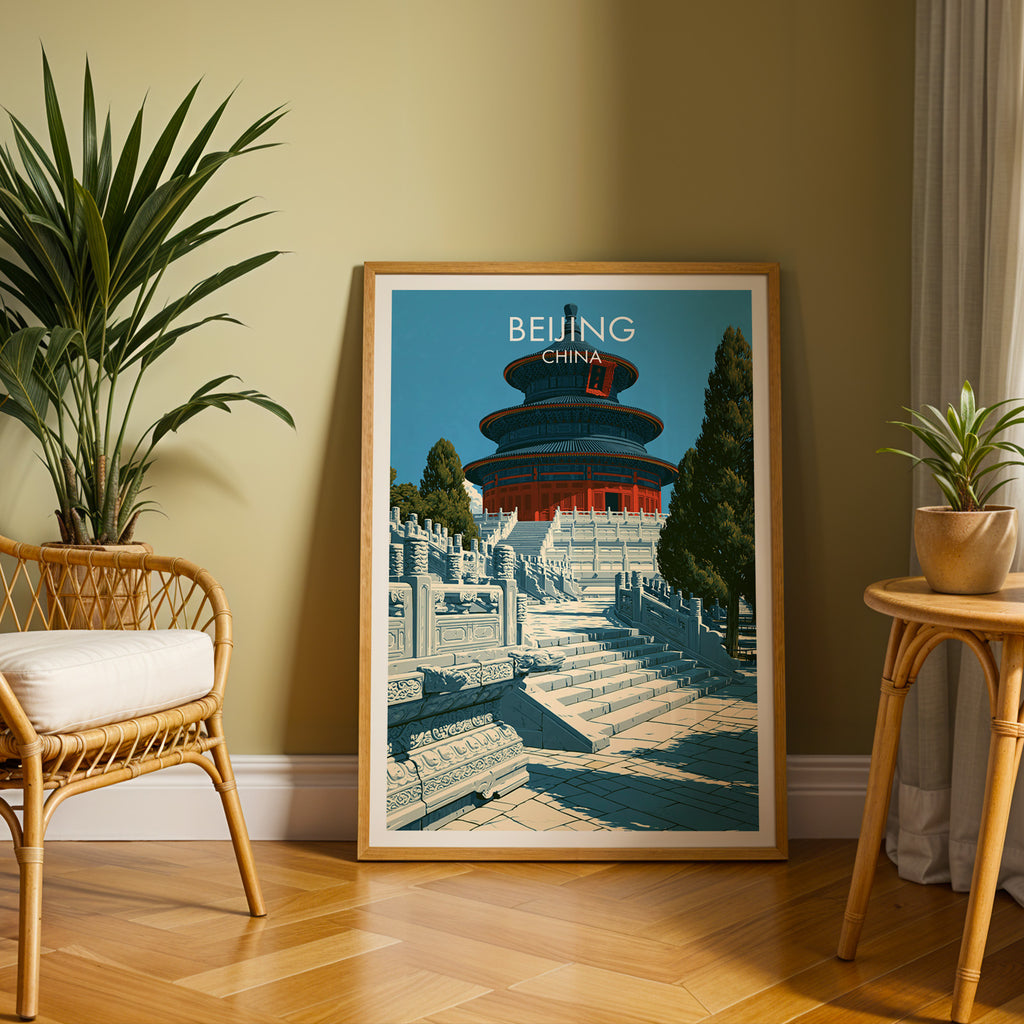 Large Temple of Heaven Beijing travel print in an oak frame leaning on a herringbone floor next to a rattan chair