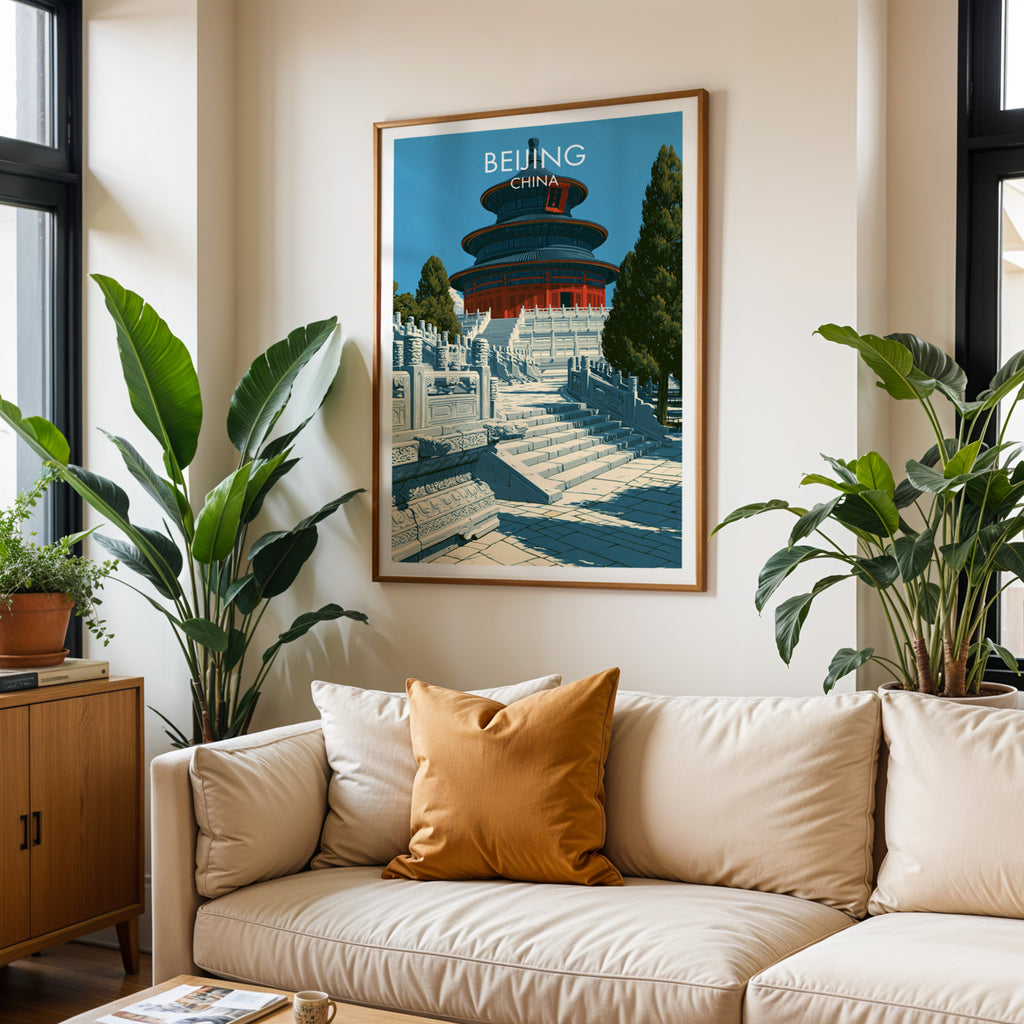 Framed Temple of Heaven Beijing wall art hanging above a cream sofa in a bright living room with tropical plants