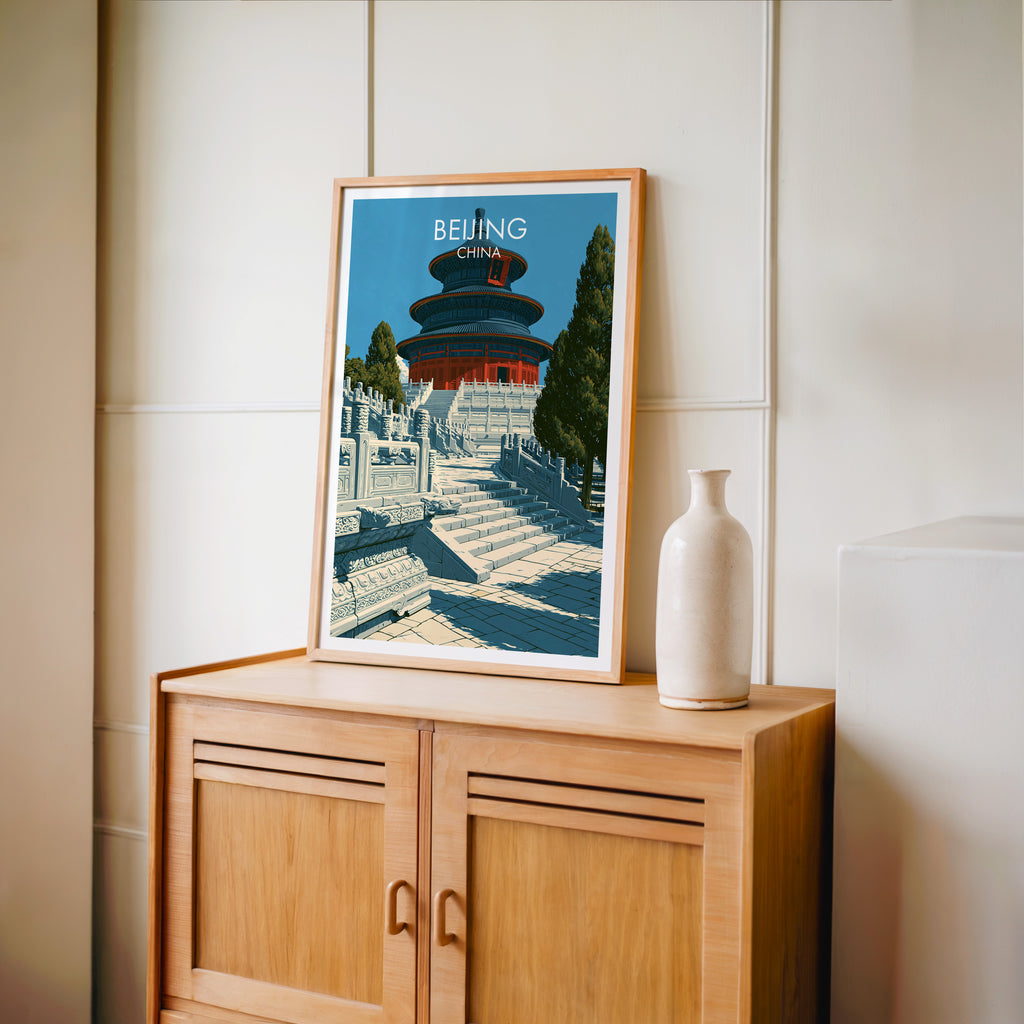 Small Temple of Heaven Beijing travel poster in an oak frame on a mid-century sideboard with a ceramic vase