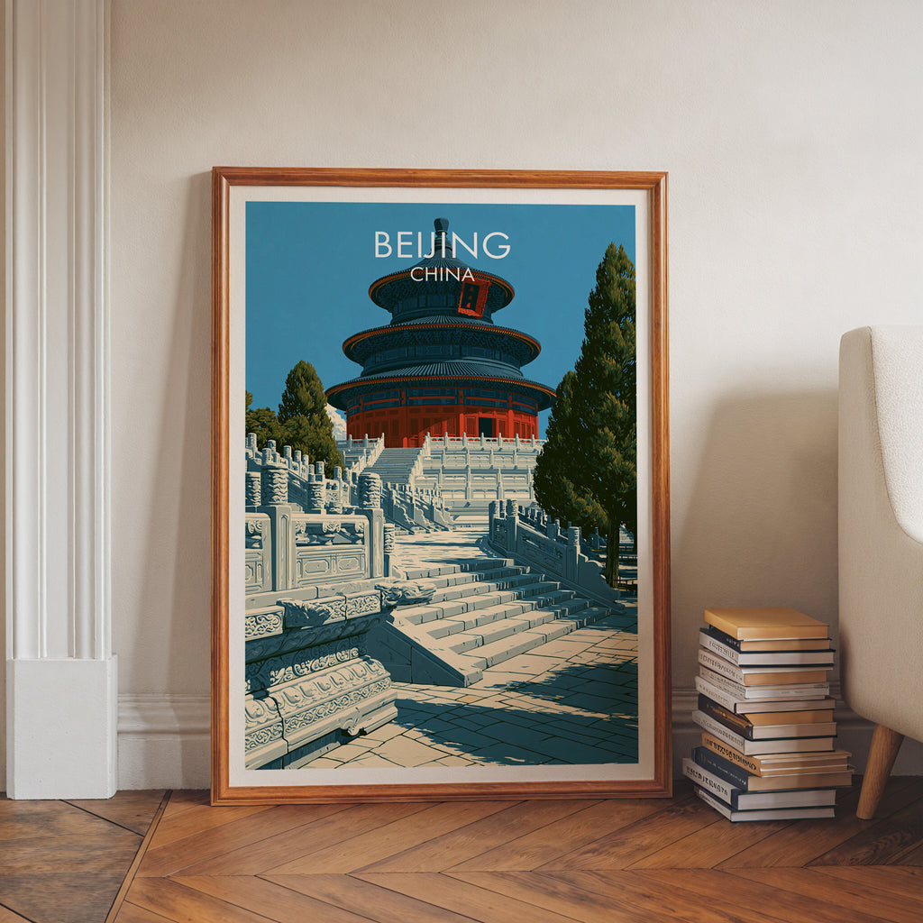 Temple of Heaven Beijing art print in a walnut frame leaning in a hallway beside stacked books
