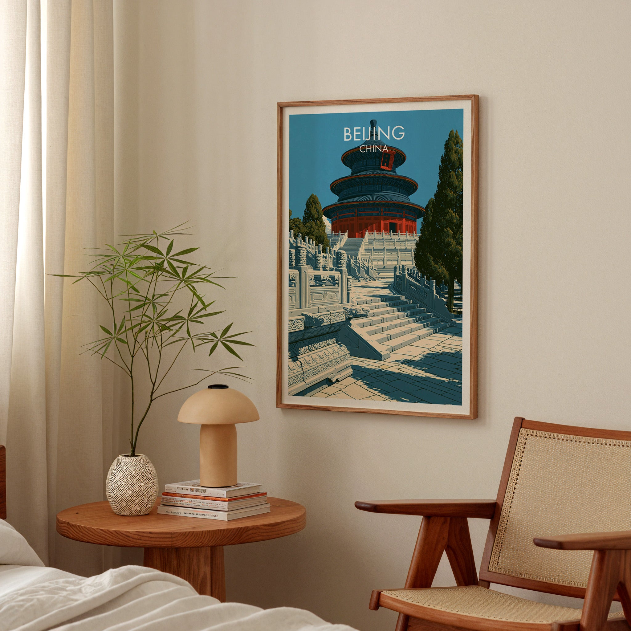 Temple of Heaven Beijing poster above a bedroom nightstand with a bamboo plant and mushroom lamp