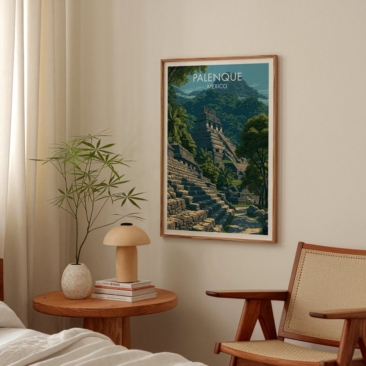 Mexico travel art in an oak frame in a bedroom above a round bedside table with a mushroom lamp