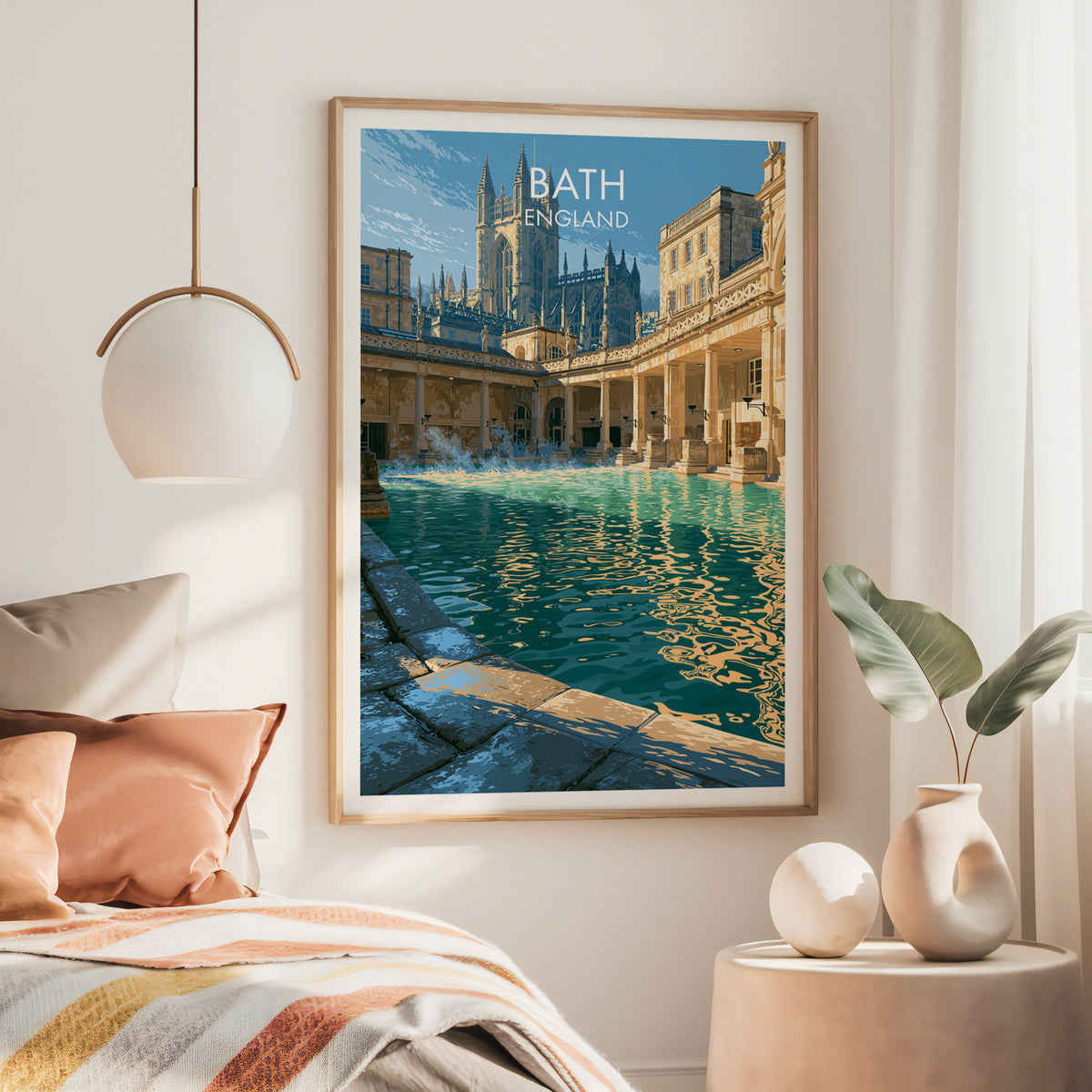 Roman Baths terrace print, large oak frame above a bed with rust bedding and a brass globe pendant