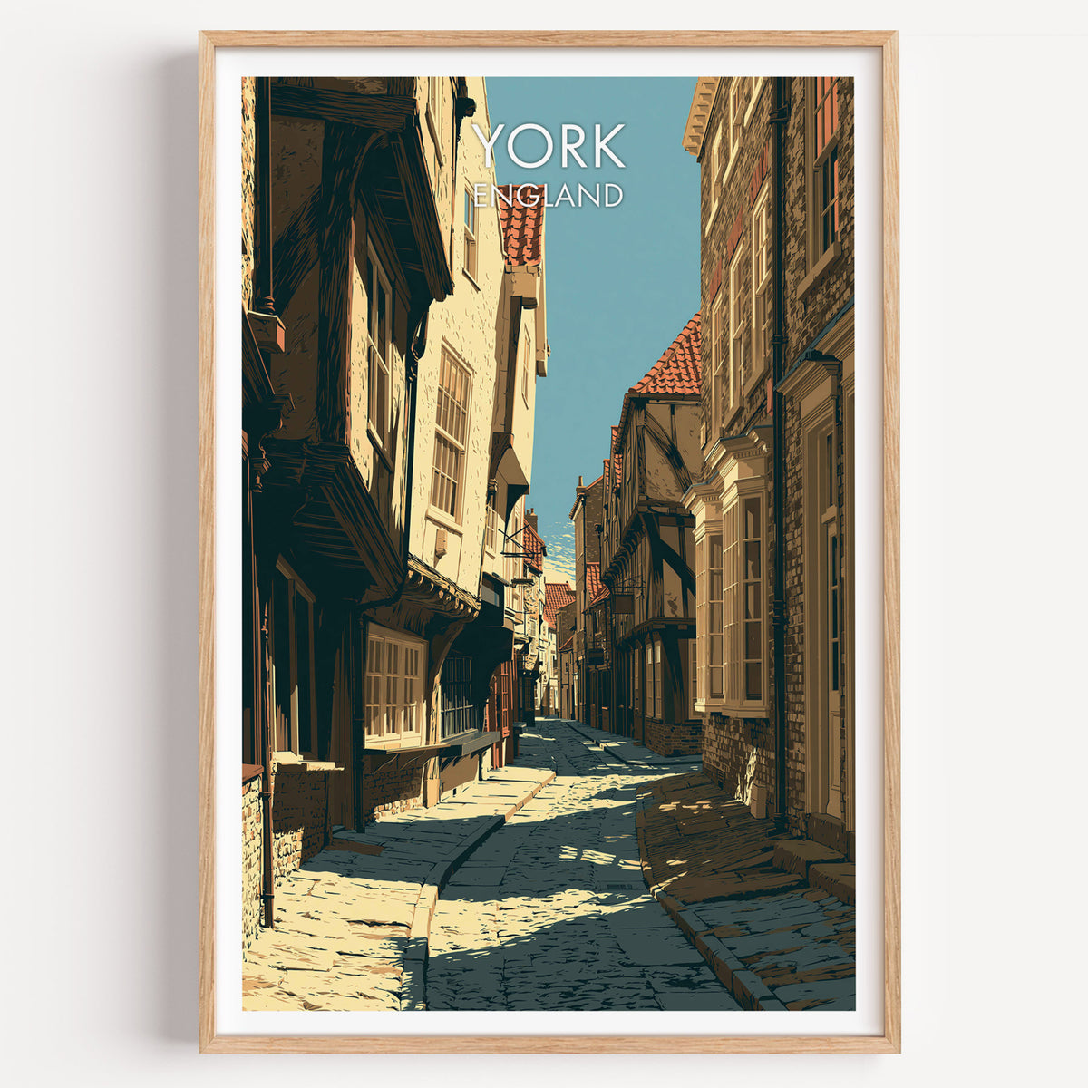 York Shambles travel poster, light oak frame on a plain white wall