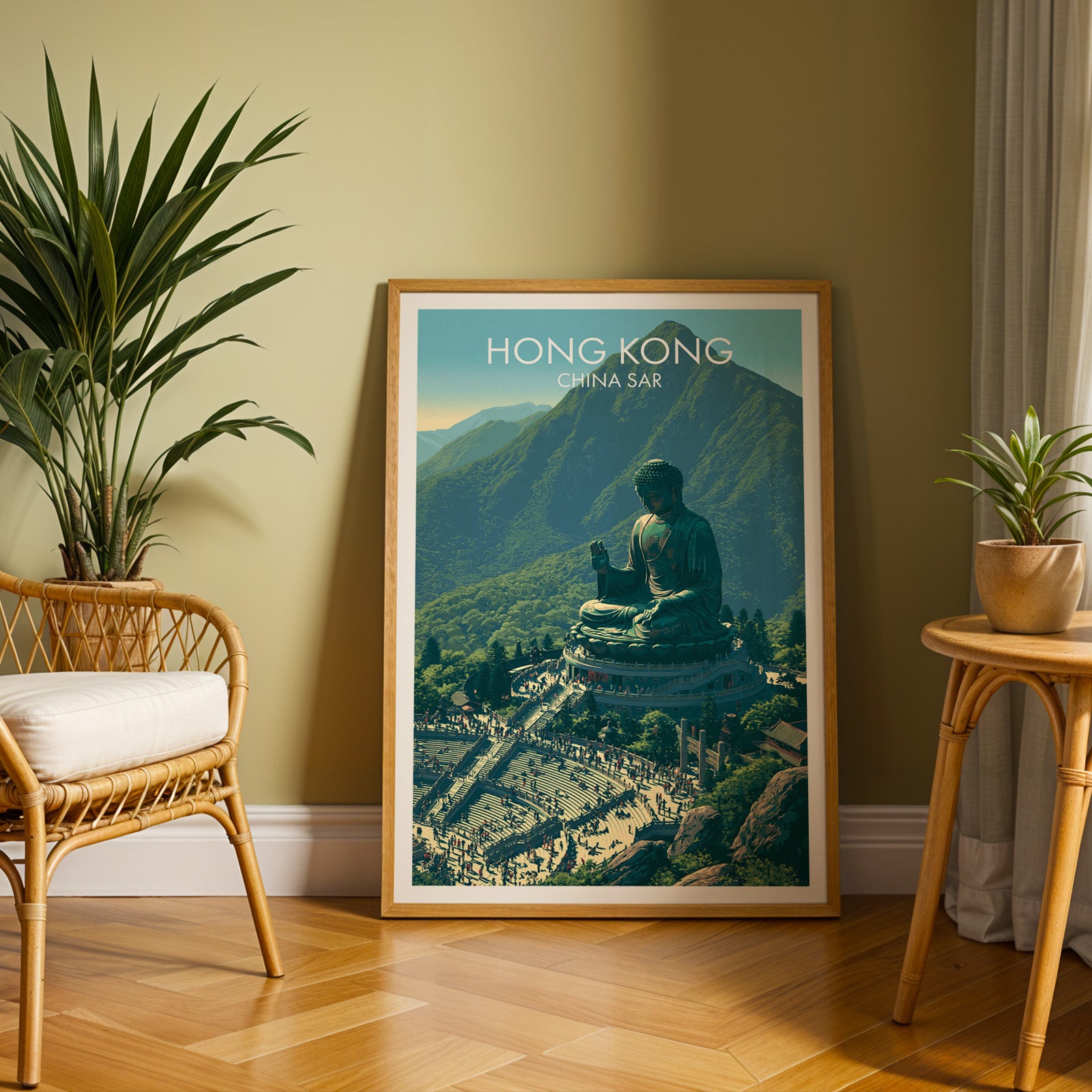 Large Tian Tan Big Buddha Hong Kong travel print in an oak frame leaning on a herringbone floor next to a rattan chair