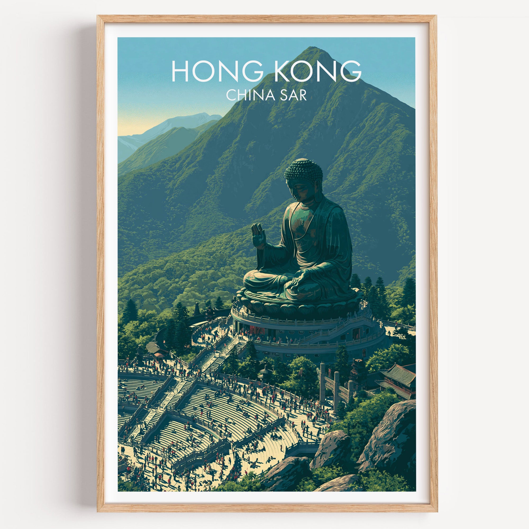 Tian Tan Big Buddha Hong Kong travel poster in a natural wood frame, shown against a clean white wall
