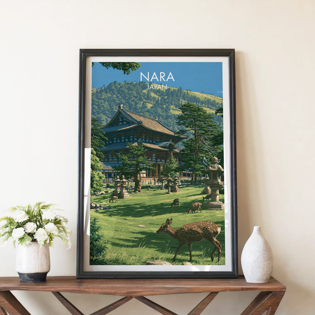 Todai ji Temple Nara Japan travel poster in a black frame on a wooden console table with white flowers