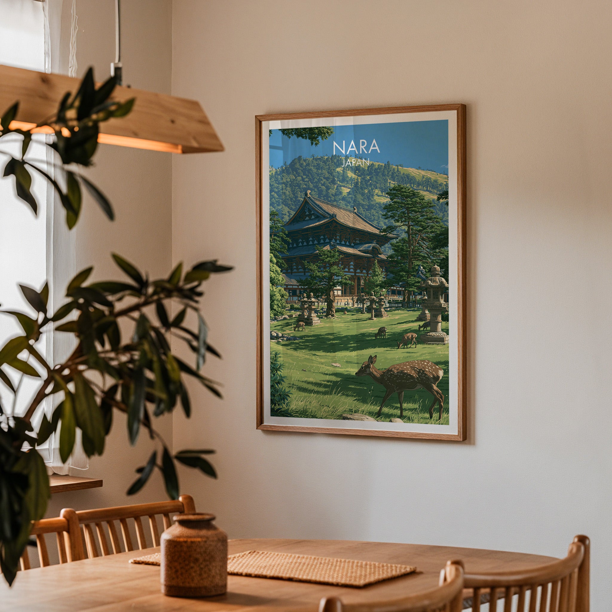 Framed Todai ji Temple Nara Japan print on a dining room wall above an oak table in warm afternoon light