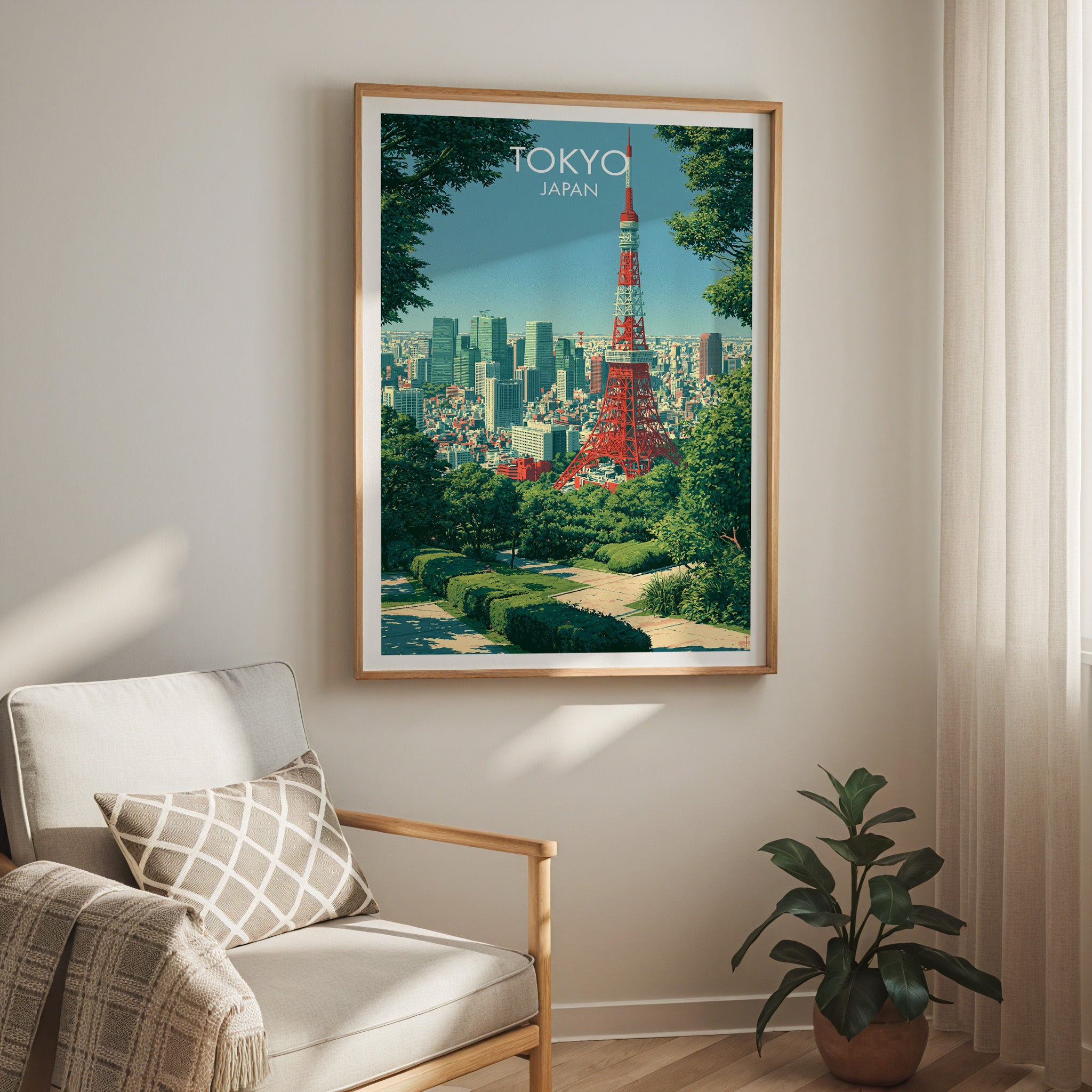 Tokyo Tower Japan travel print in a light oak frame on a living room wall beside a linen armchair