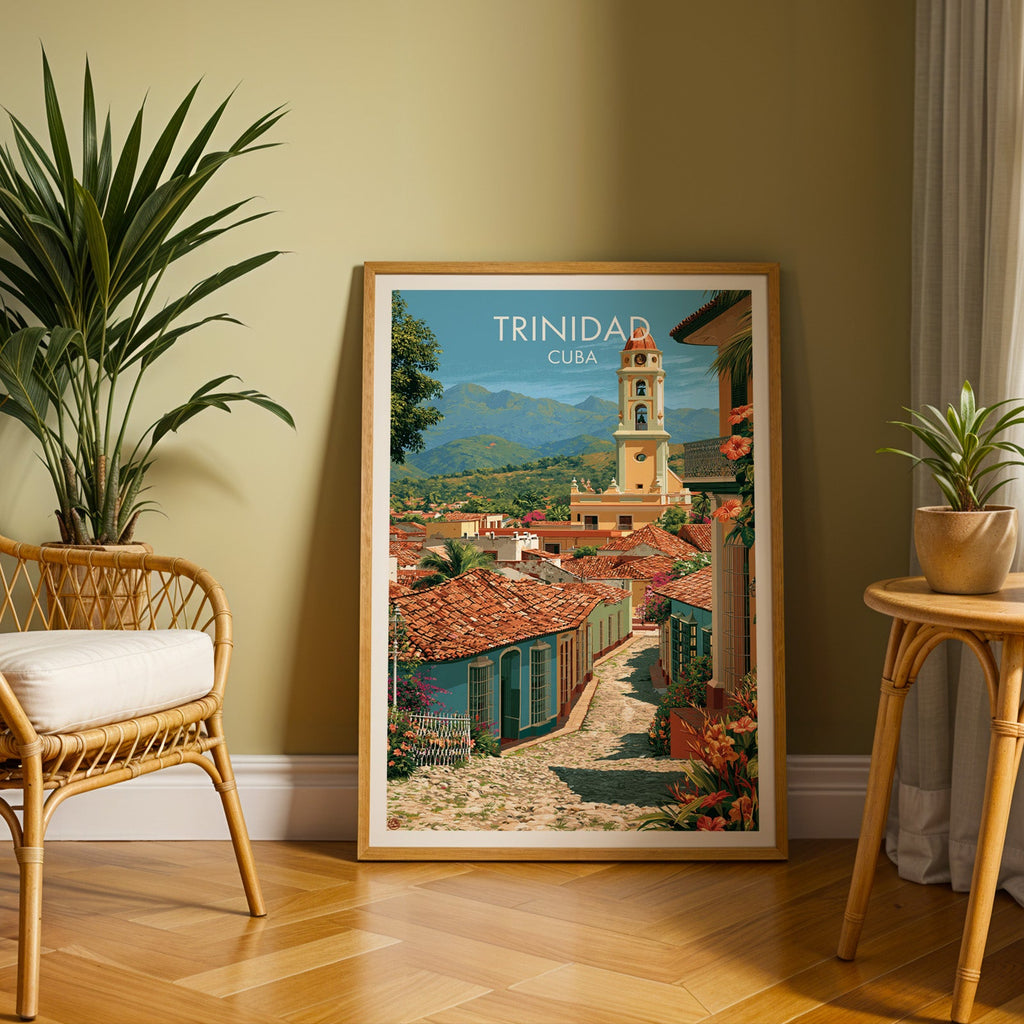 Teal colonial houses in an oak frame leaning on herringbone parquet, rattan chair left, cane table and plant right