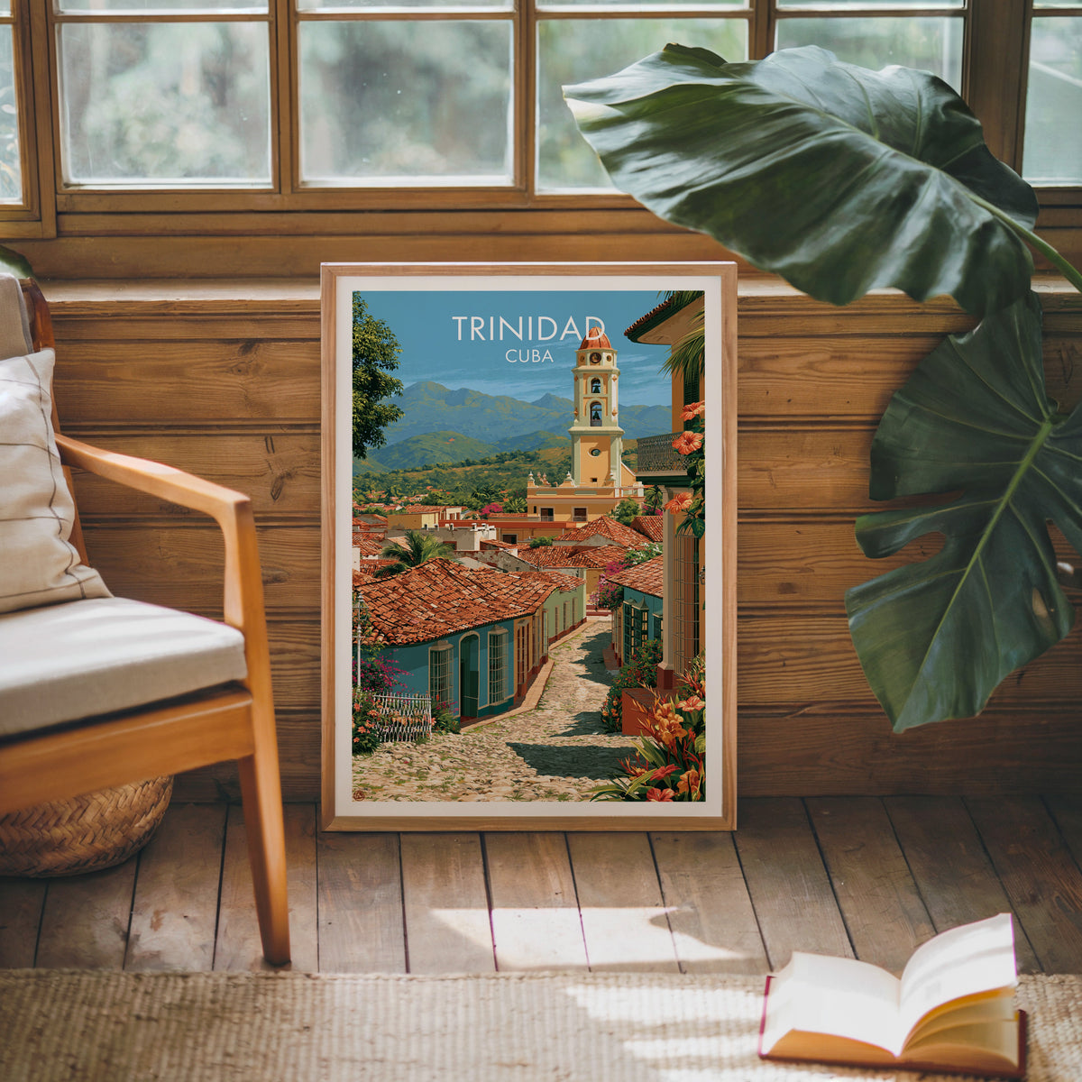 Tropical flowers and tiled roofs in an oak frame on a pine cabin wall with a wooden armchair and monstera leaf