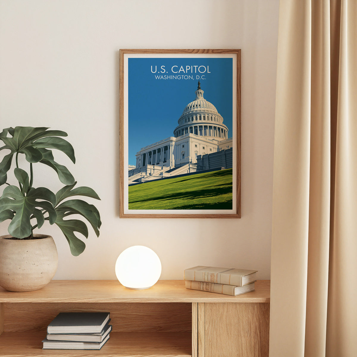 Cast-iron dome print in oak on a beige wall with an oak console, monstera in stone and a globe lamp.