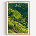 Ubud Rice Terraces Bali travel poster in a natural wood frame, shown against a clean white wall