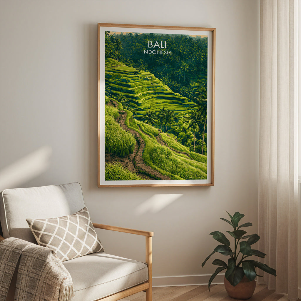 Ubud Rice Terraces Bali travel print in a light oak frame on a living room wall beside a linen armchair