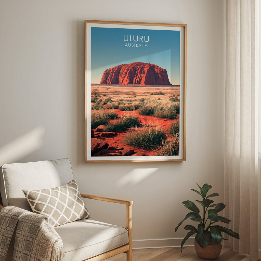Rust and teal print hung above a cream armchair with a lattice cushion, sheer curtain and rubber plant