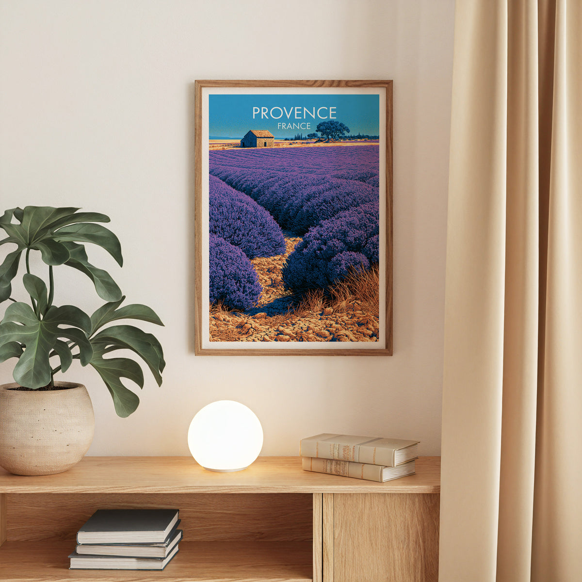 Valensole lavender field print, oak frame above an oak console with a monstera and a round globe lamp
