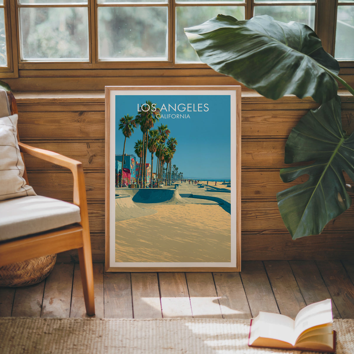 Skate bowl and sand print in oak on a sunlit wood-grain wall by a mid-century armchair and open book.
