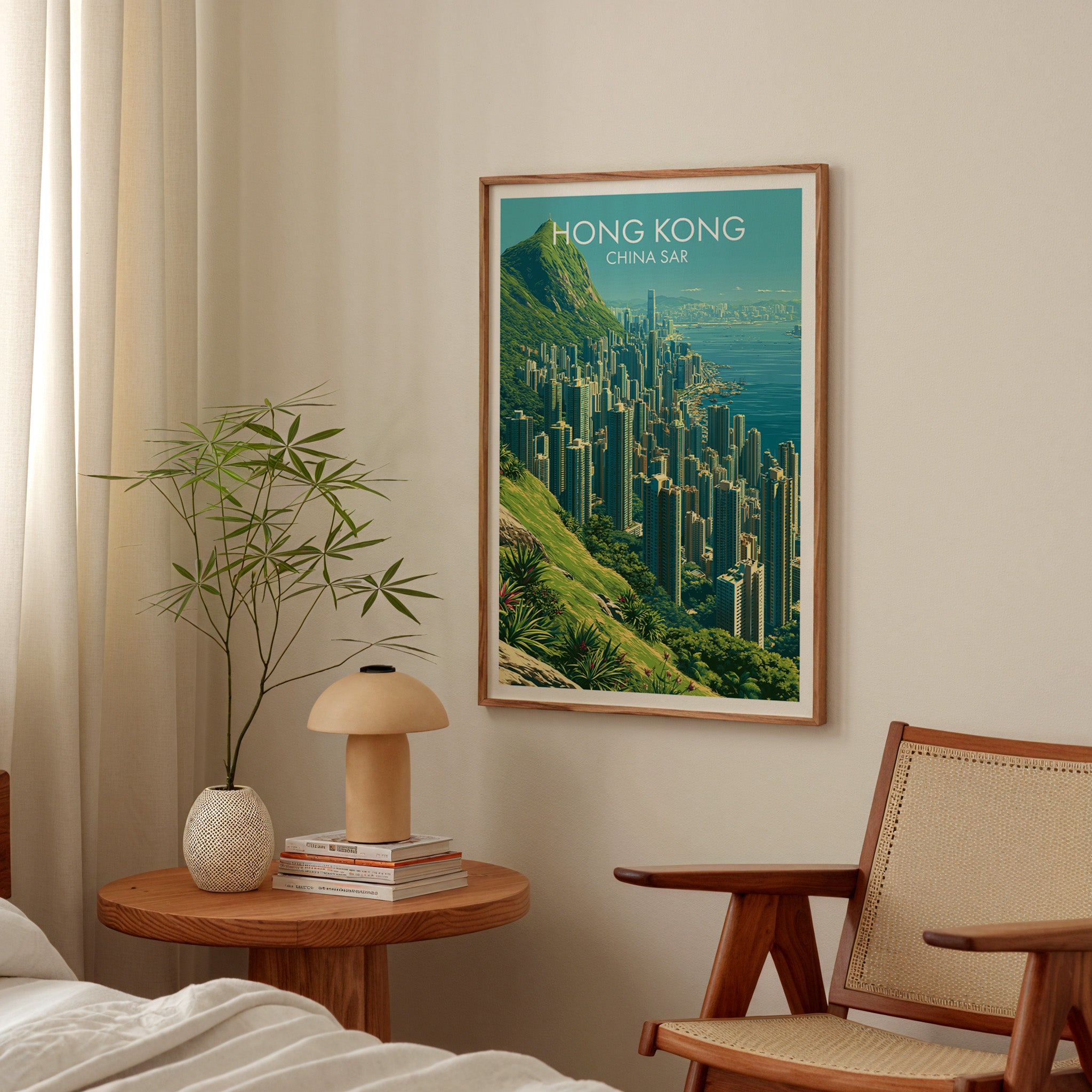 Victoria Peak Hong Kong poster above a bedroom nightstand with a bamboo plant and mushroom lamp