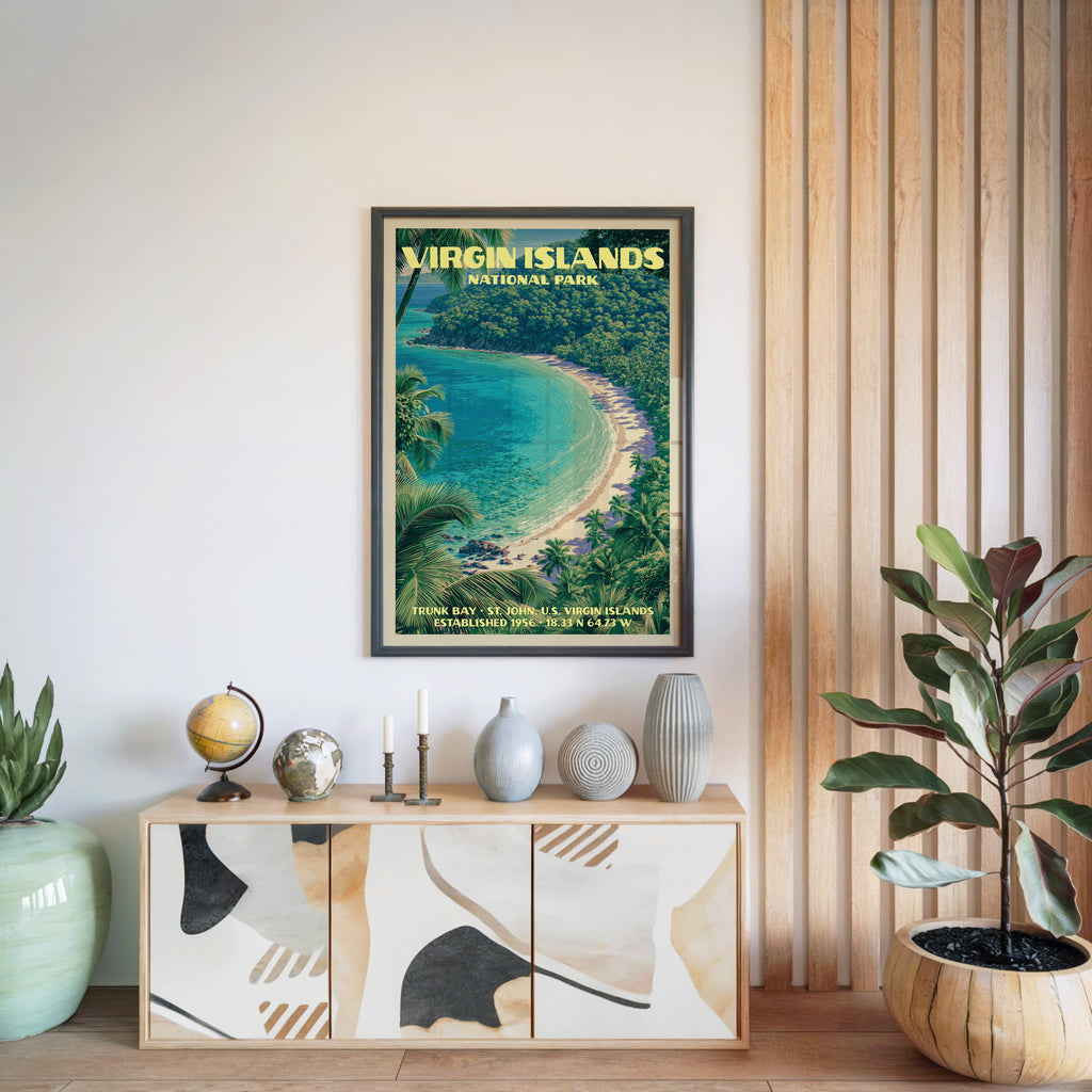 Virgin Islands National Park print in a black frame above a light wood sideboard by a slatted wall panel