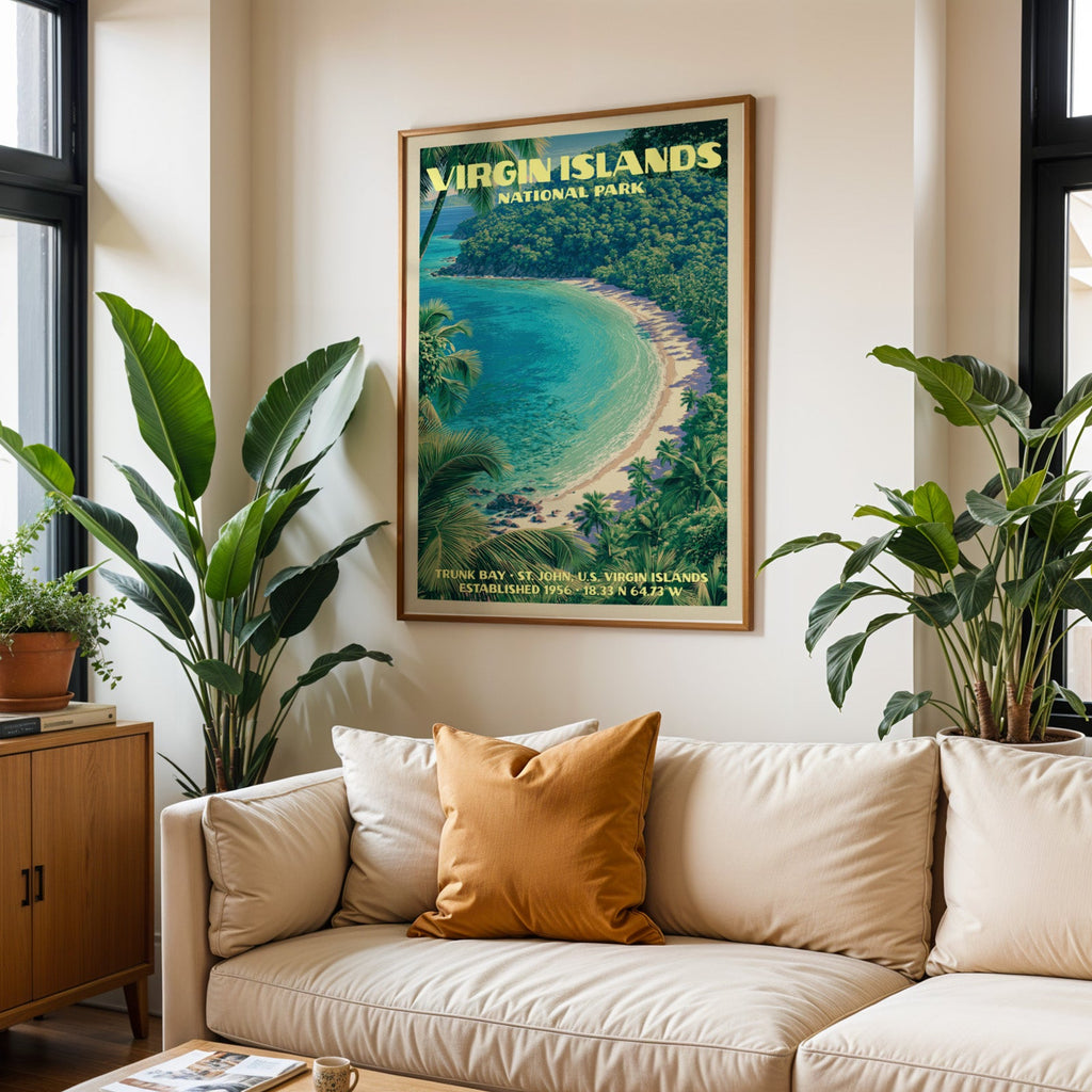Virgin Islands vintage travel print in oak above a cream sofa with a rust cushion and tall houseplants