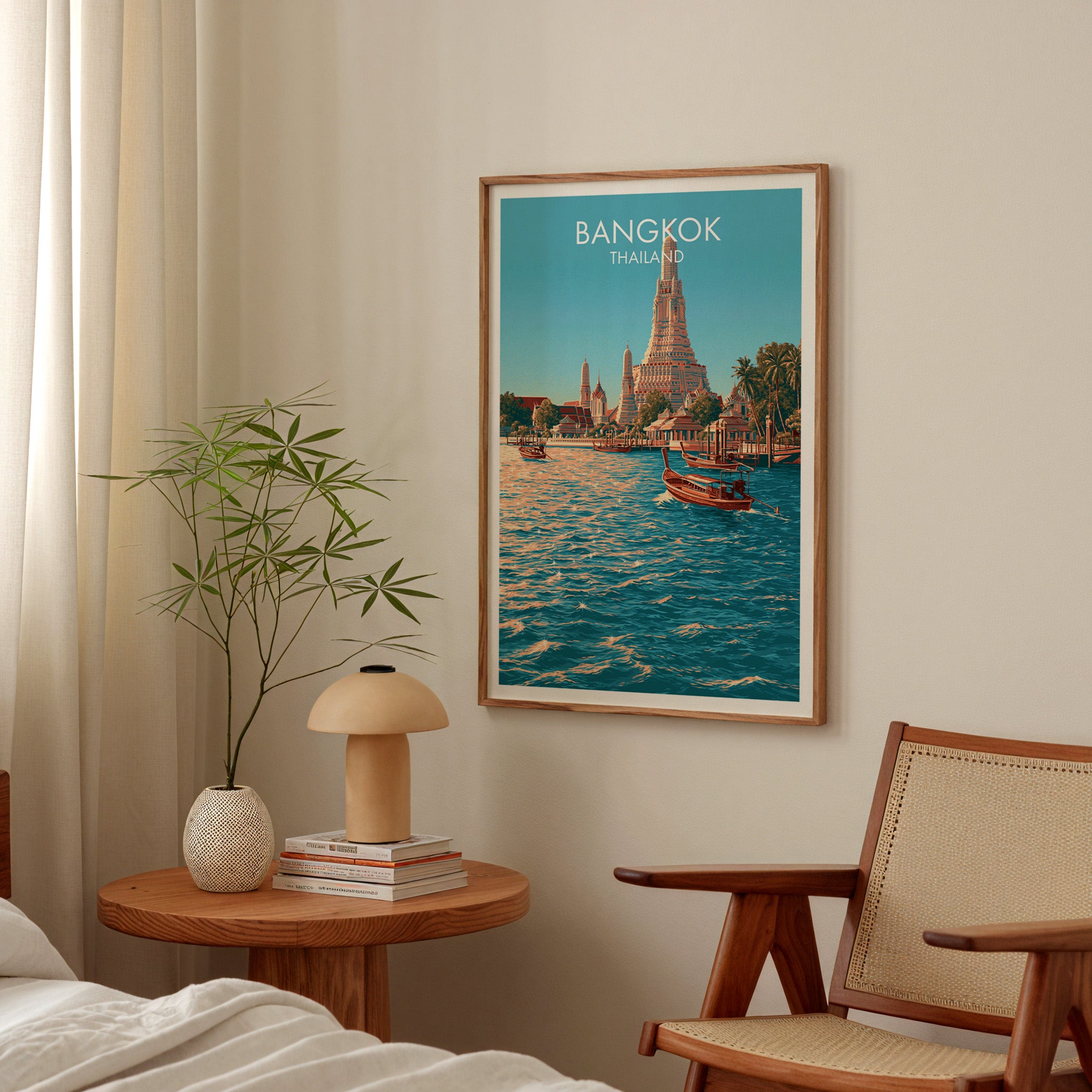 Wat Arun Bangkok Thailand poster above a bedroom nightstand with a bamboo plant and mushroom lamp