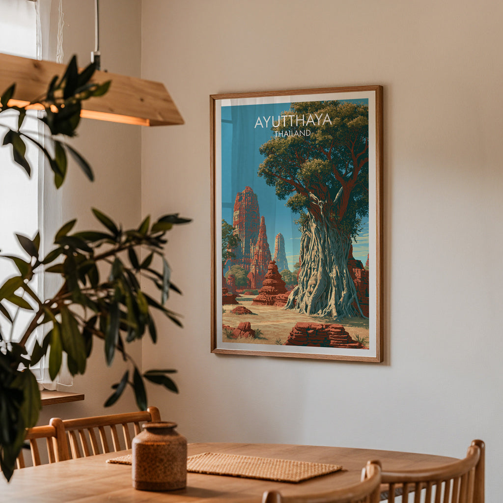 Framed Wat Mahathat Ayutthaya Thailand print on a dining room wall above an oak table in warm afternoon light