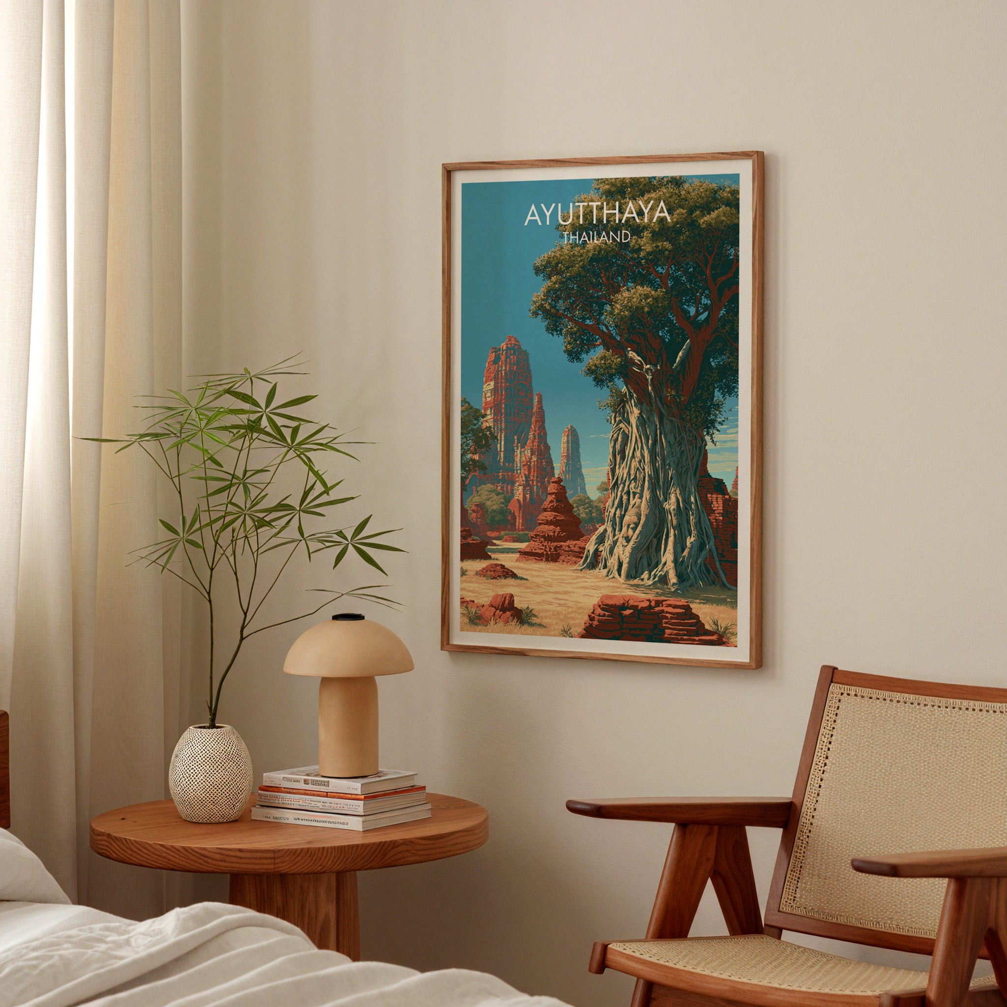 Wat Mahathat Ayutthaya Thailand poster above a bedroom nightstand with a bamboo plant and mushroom lamp