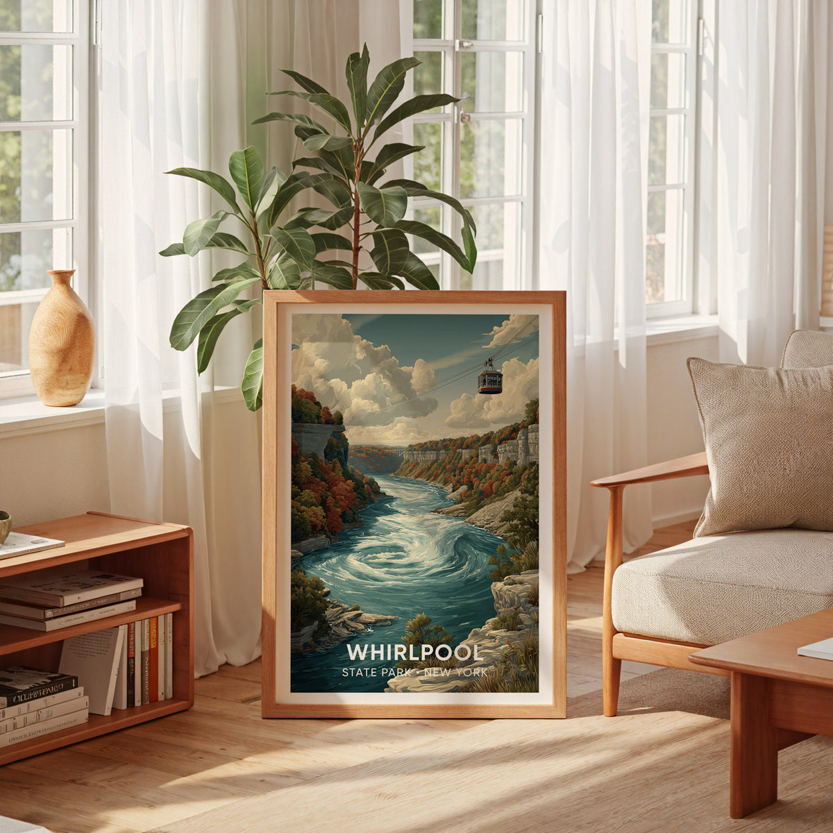 Whirlpool gorge poster leaning by a curtained window with a tall plant, low shelf and cream armchair