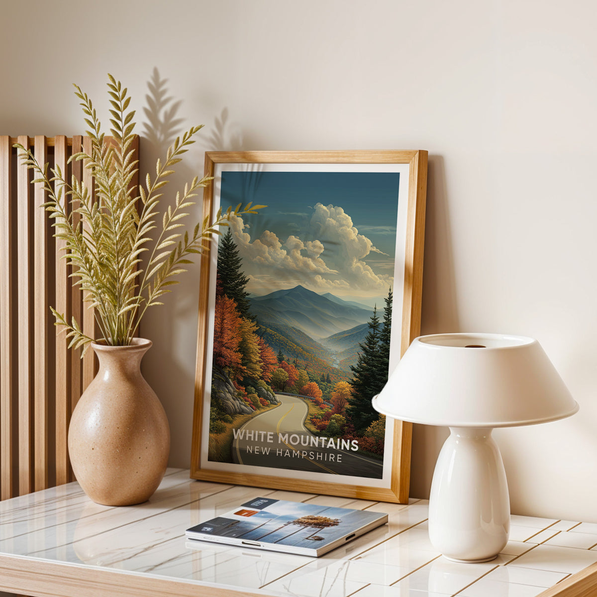 Fall foliage drive print in oak on a stone balance table with dried leaves and a lamp
