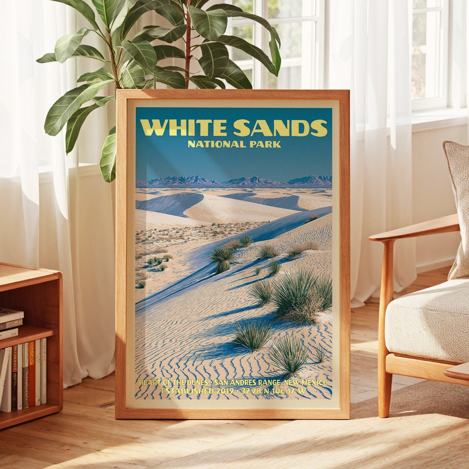 White Sands vintage poster in oak, leaning by a sunlit window with sheer curtains and a low bookshelf