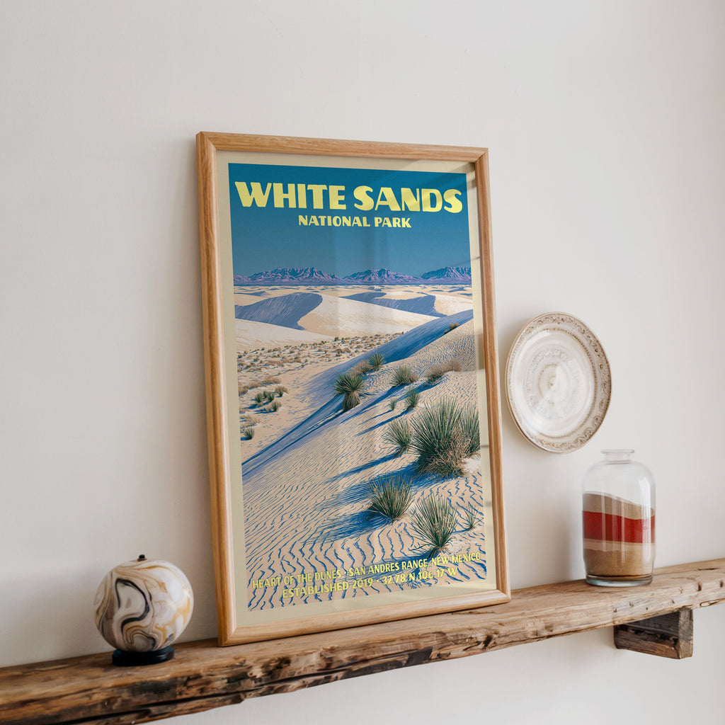 White Sands gypsum dunes print in oak, leaning on a reclaimed wood ledge with a marbled sphere and sand jar