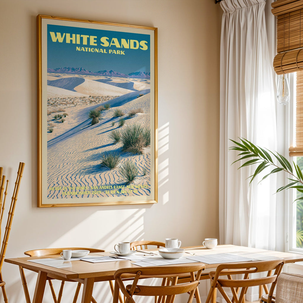 White Sands National Park print in gold above a light oak dining table by a sheer-curtained window
