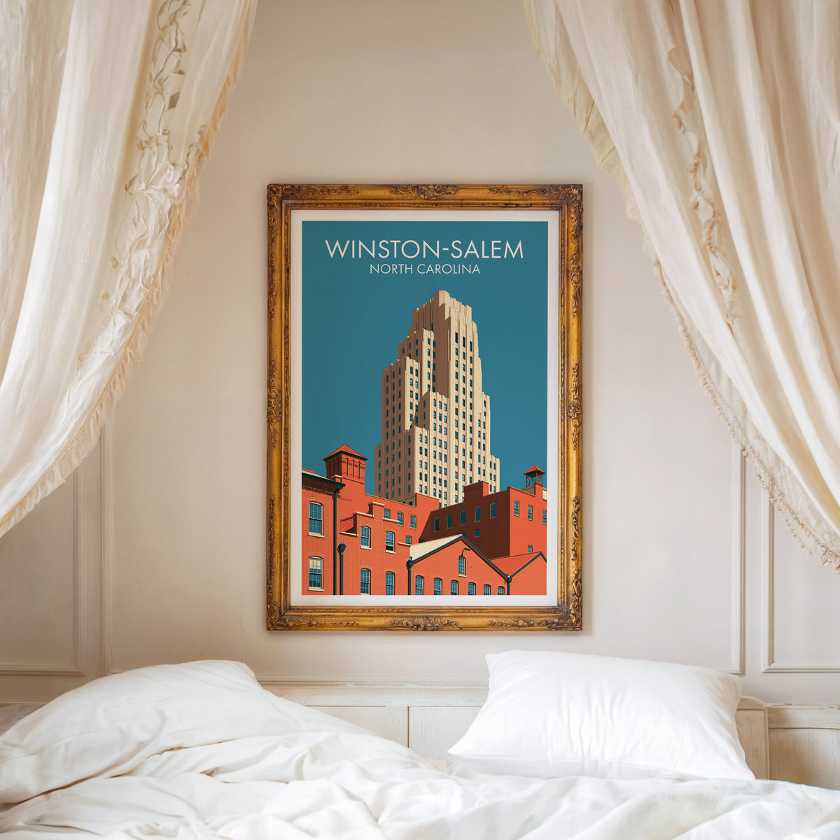 Winston-Salem wall art in a carved gold frame over a white bed with a linen canopy and moulded wall.