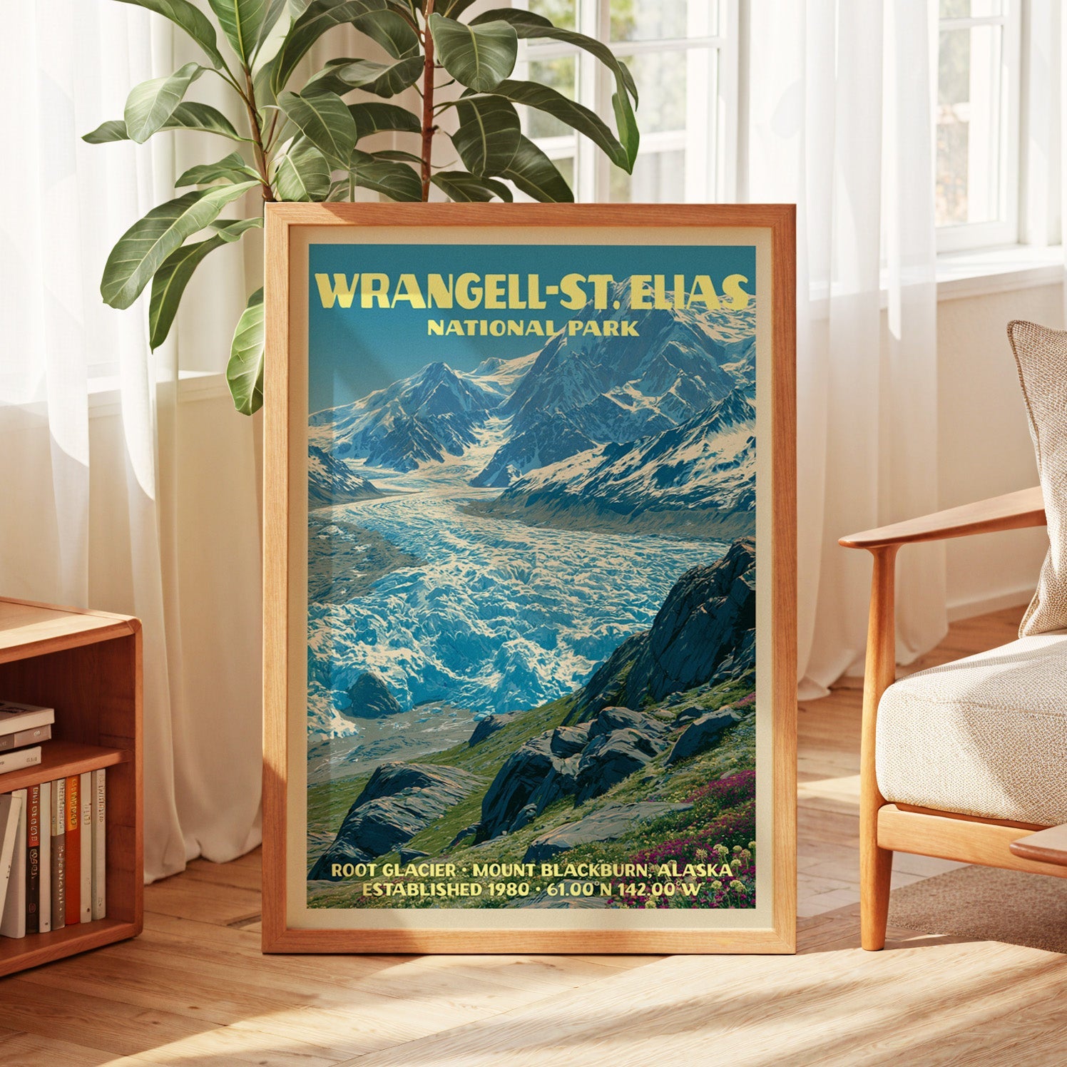 Wrangell–St. Elias vintage poster in oak, leaning by a sunlit window with sheer curtains and a low bookshelf
