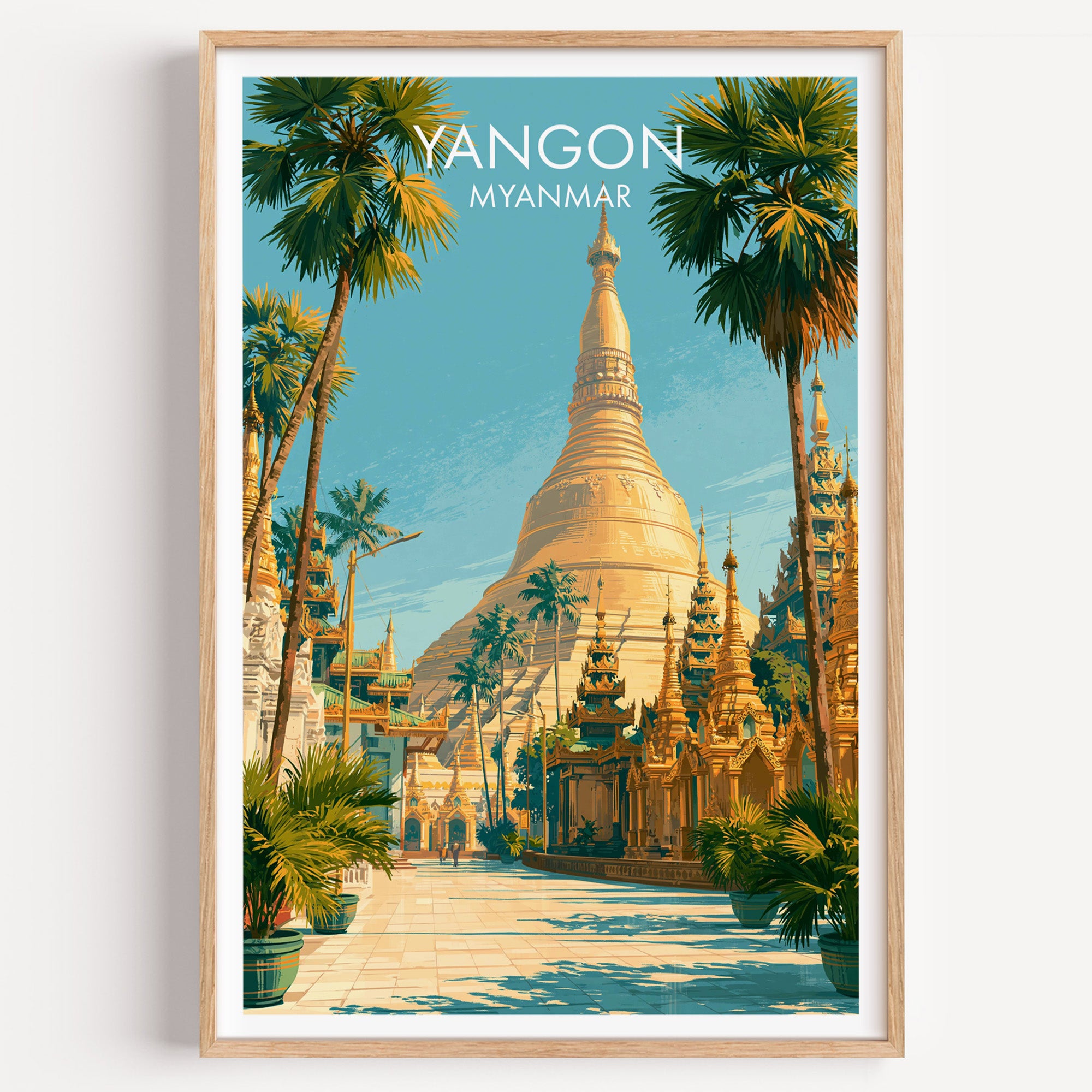 Yangon Myanmar travel poster in a natural wood frame, shown against a clean white wall