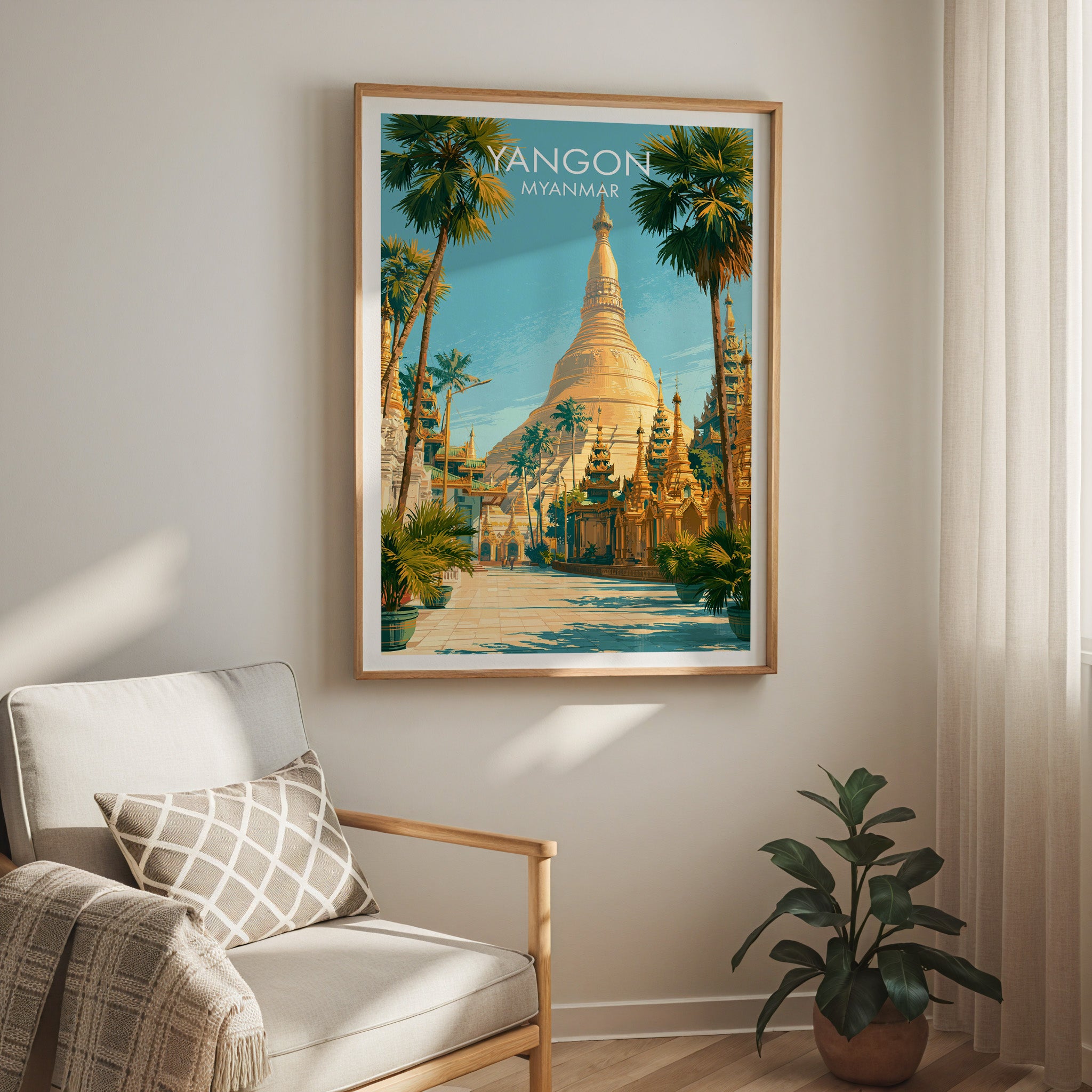 Yangon Myanmar travel print in a light oak frame on a living room wall beside a linen armchair