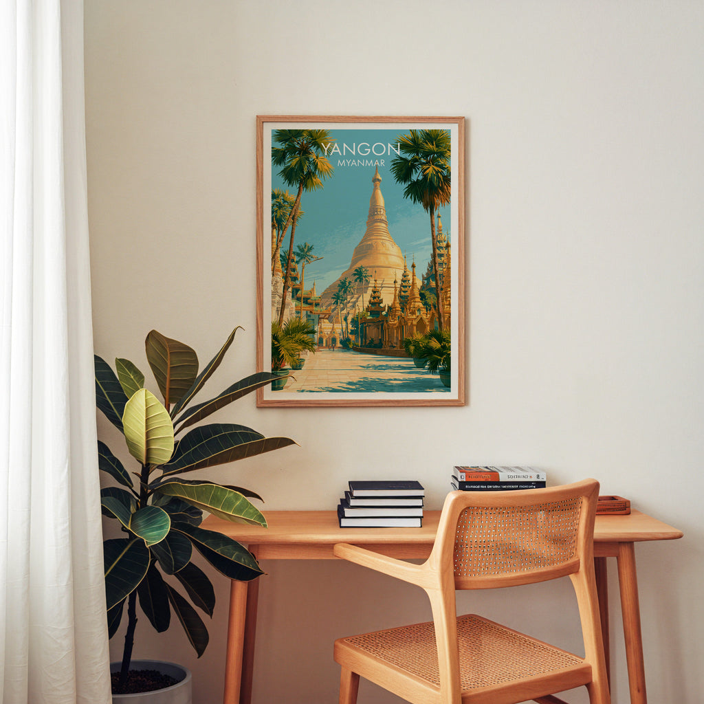 Yangon Myanmar wall art above a wooden home office desk with a rattan chair and books