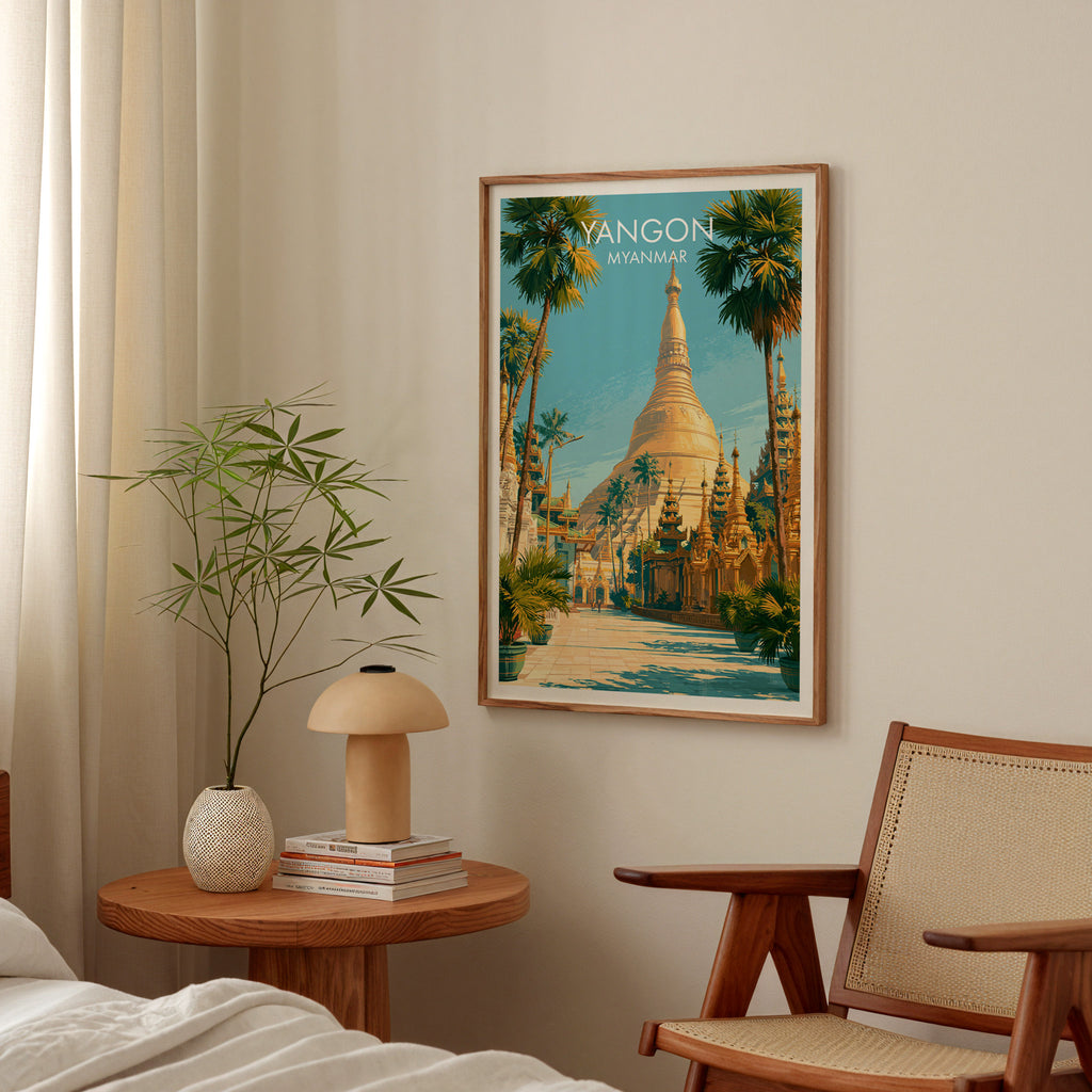 Yangon Myanmar poster above a bedroom nightstand with a bamboo plant and mushroom lamp