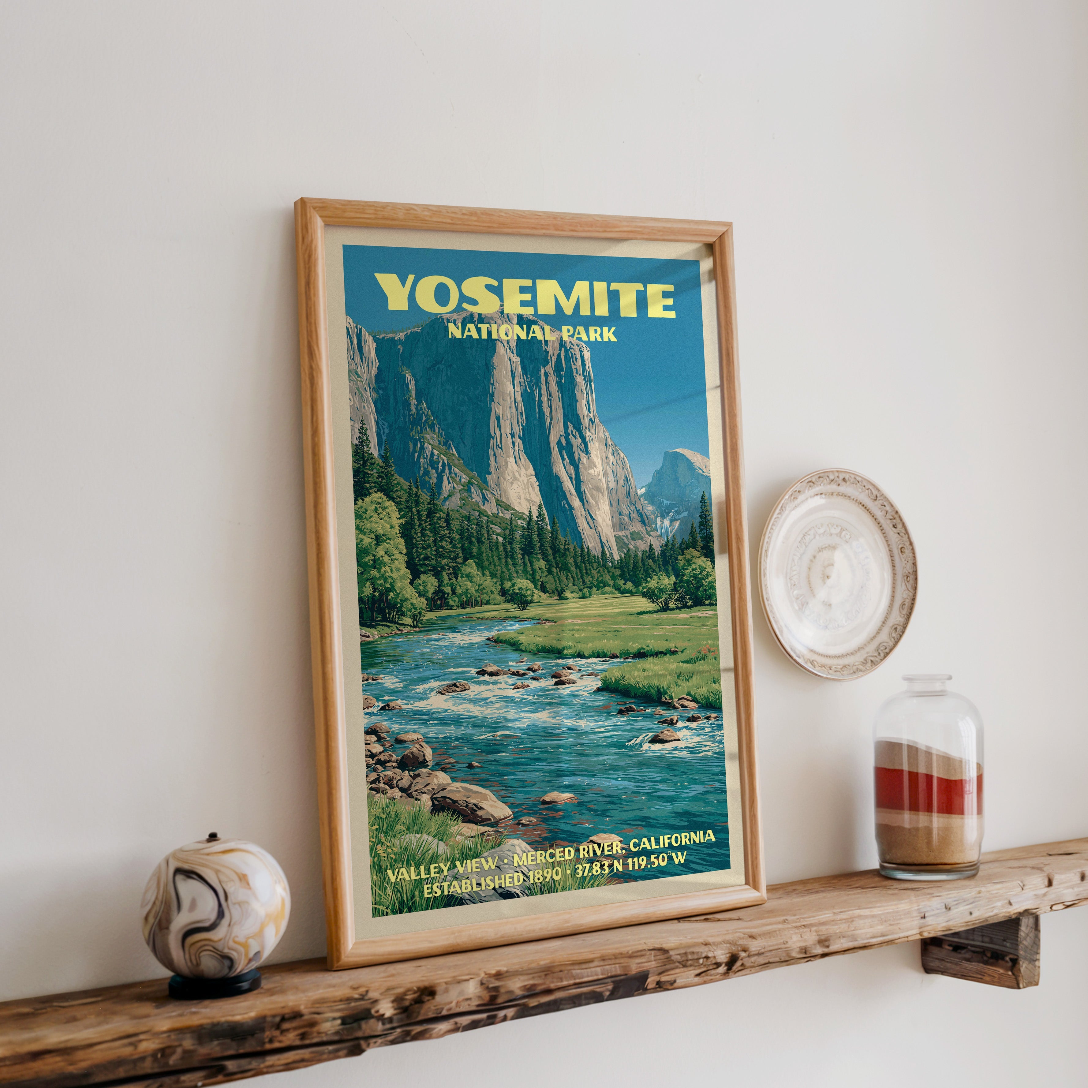 Yosemite Merced River print in oak, leaning on a reclaimed wood ledge with a marbled sphere and sand jar