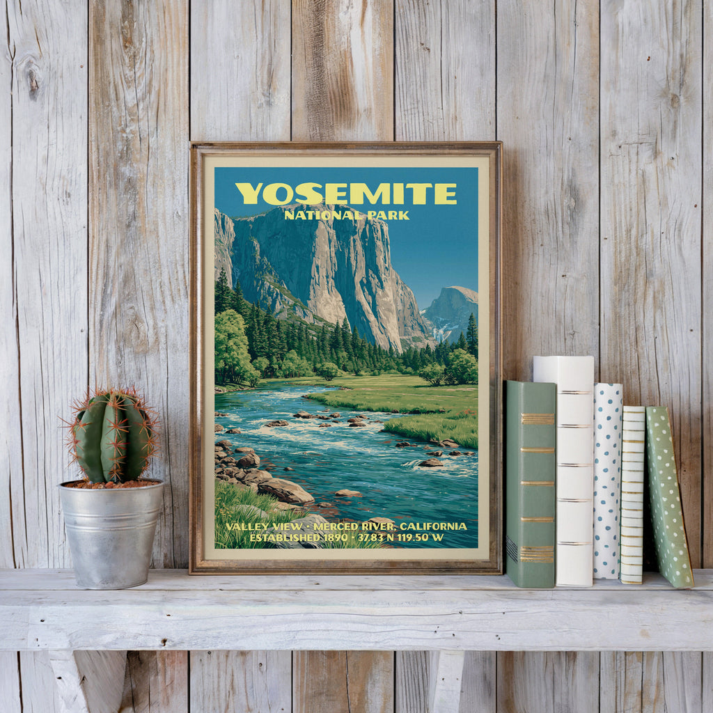 Yosemite vintage poster in a slim gold frame on a whitewashed plank wall beside a cactus and pastel books