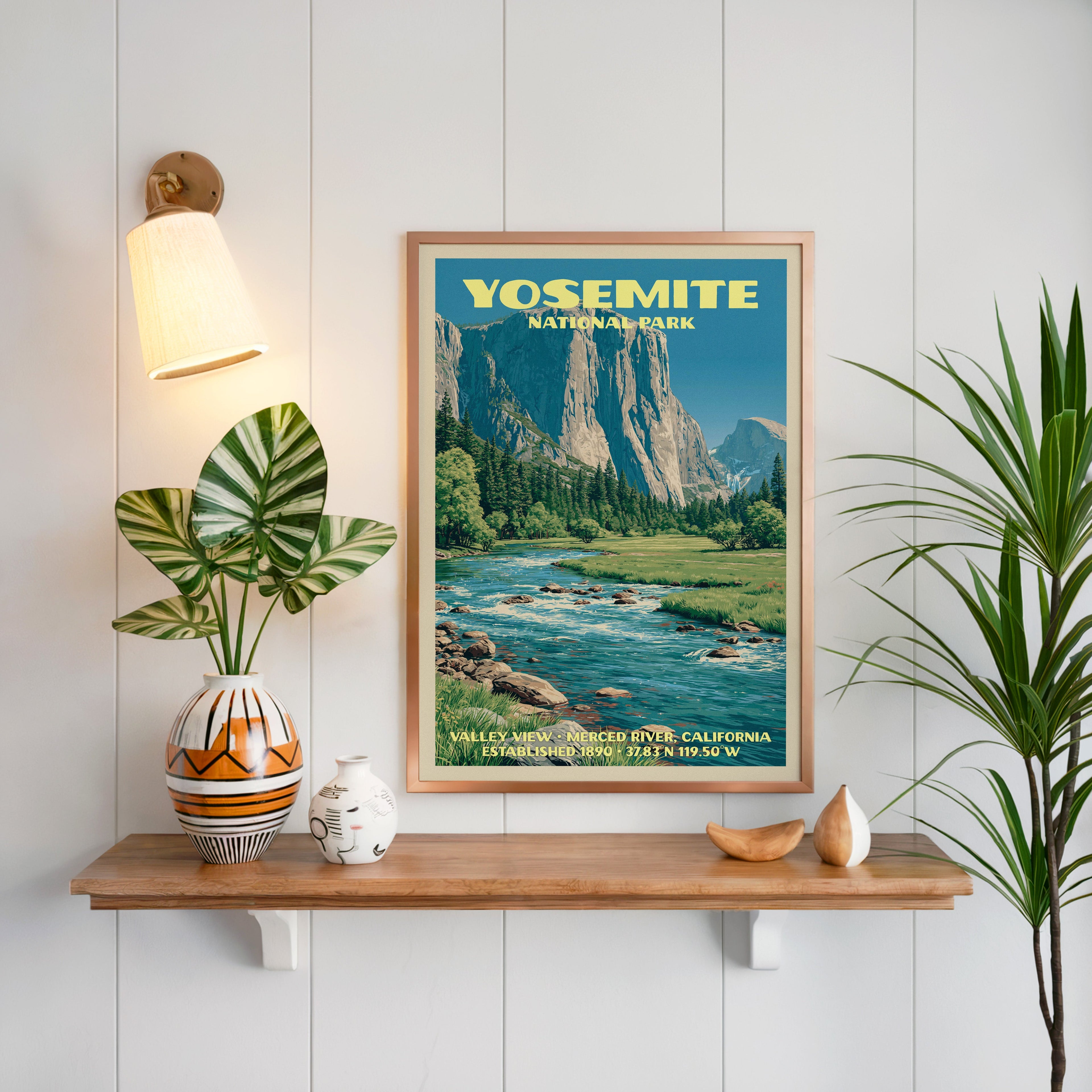 Valley View print framed in oak on white panelling above a floating shelf with a patterned vase and sconce