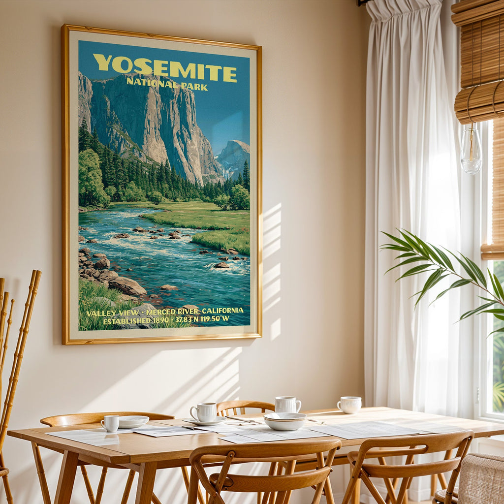 Yosemite National Park print in gold above a light oak dining table by a sheer-curtained window