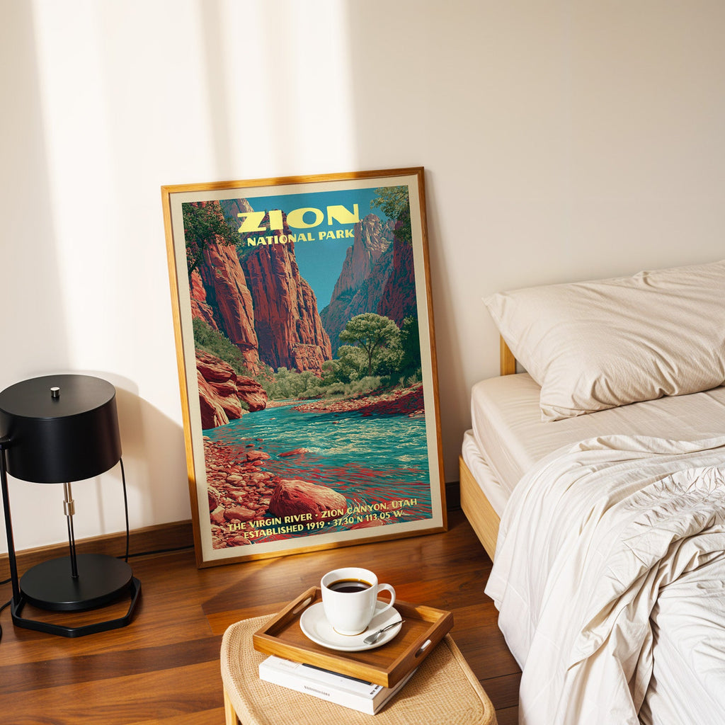 Virgin River Zion poster in a gold frame on the bedroom floor beside a made bed and a black table lamp
