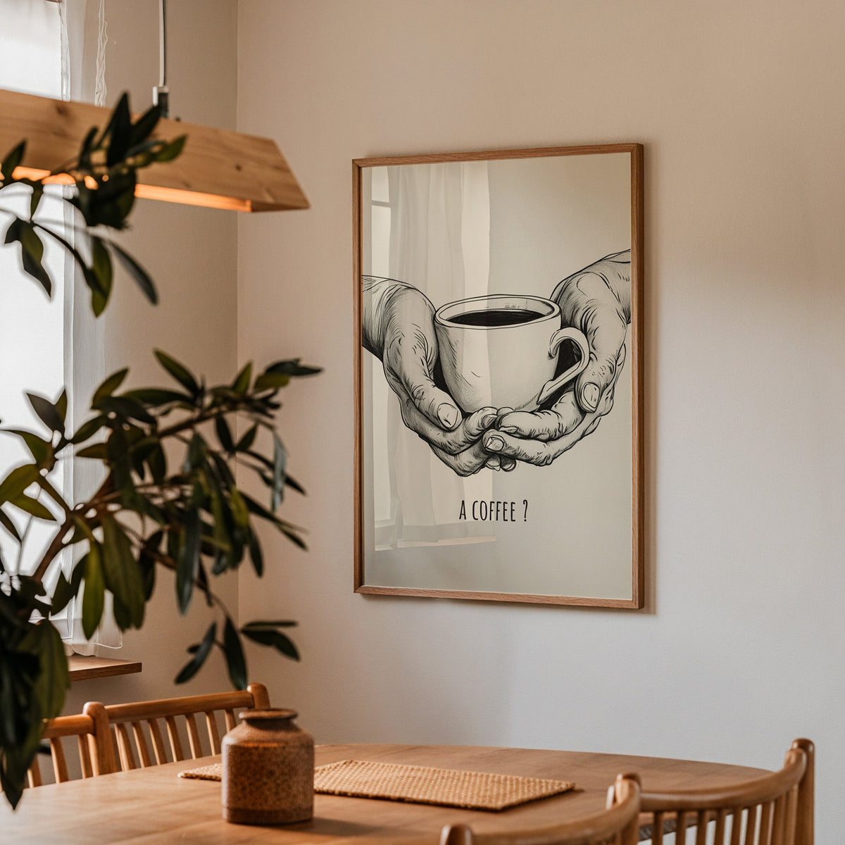 A Coffee sketch print in a walnut frame above a dining table with olive branches
