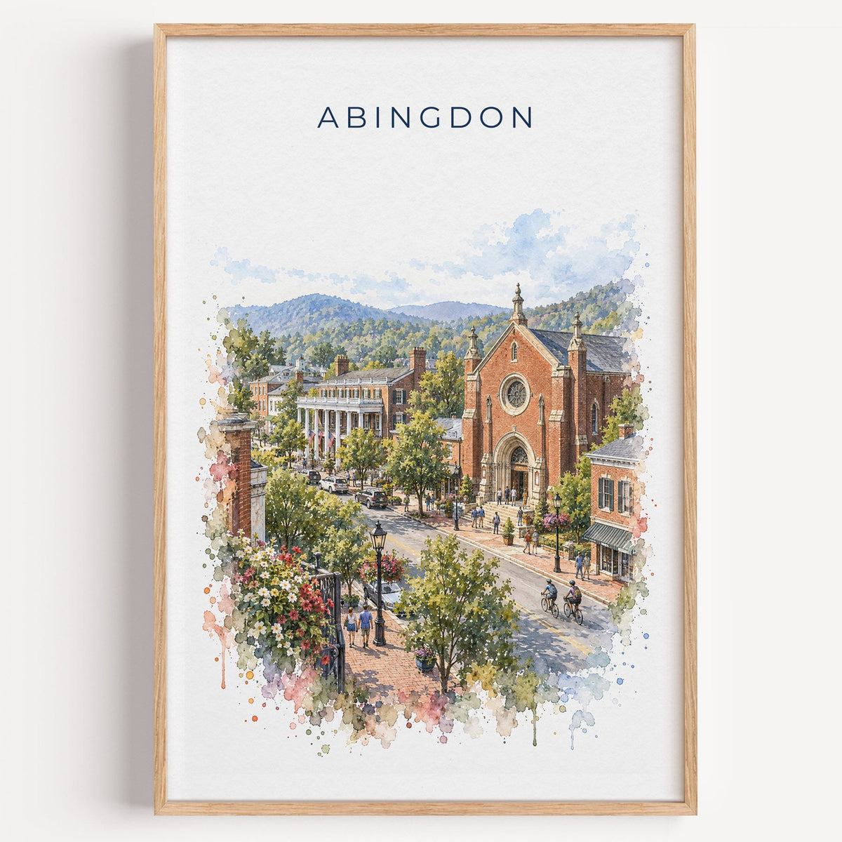 Abingdon, Virginia watercolor print in a light oak frame on a plain white wall