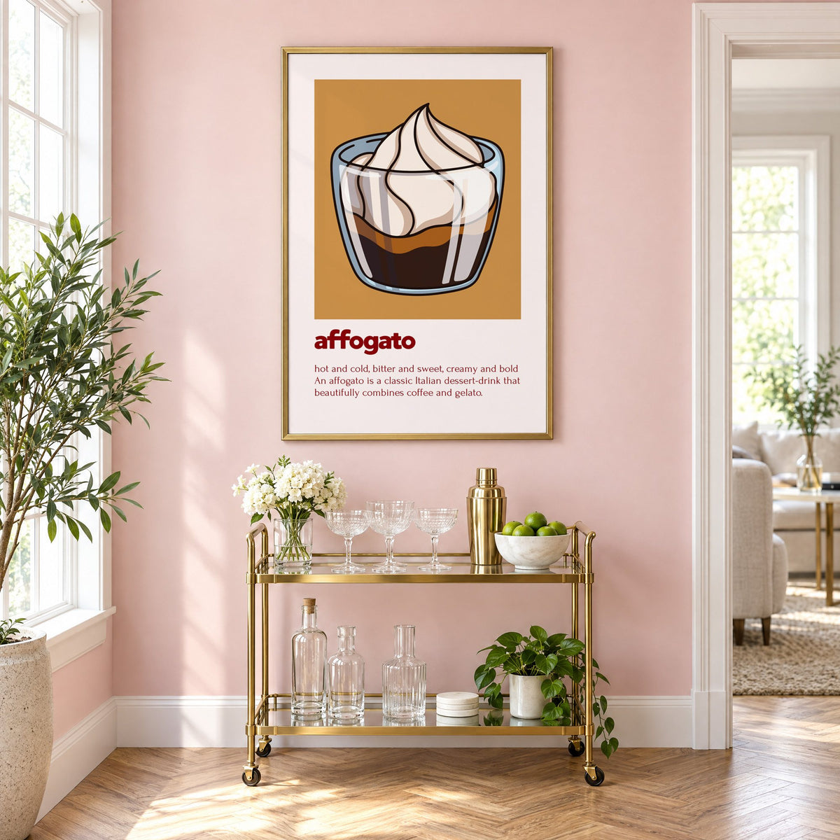 affogato gelato and coffee ochre card print in a brass frame on a blush pink wall above a gold bar cart with glassware