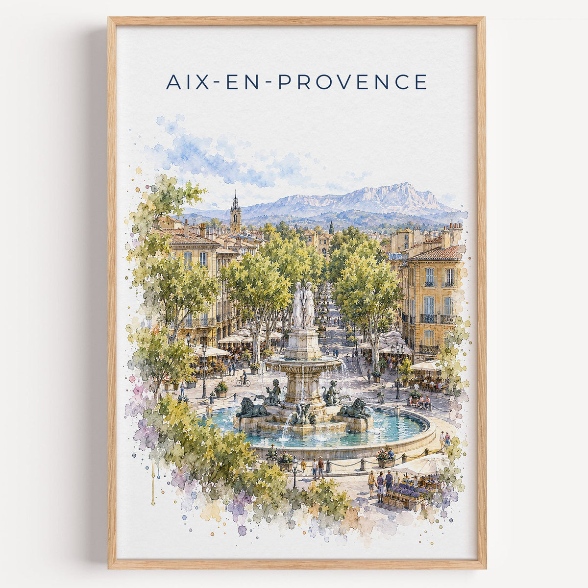 Aix-en-Provence watercolor print in a light oak frame on a plain white wall